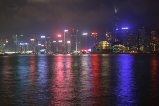 Hong Kong, China - April 18, 2014: Panorama of Hong Kong Island buildings from Kowloon at night time