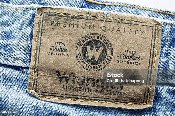 Closeup Of Wrangler Leather Label Sewed On A Blue Jeans Stock Photo -  Download Image Now - iStock