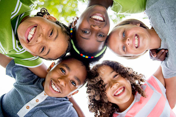 istock Children Smiling in a Huddle 487419534