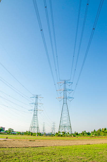 istock tower for electricity in rural landscape under blue sky 487419741