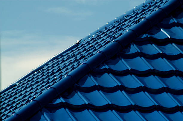 istock pattern of blue roof tiles 487422124