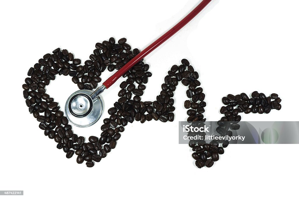 stethoscope on cardiogram line forming heart made from coffee bean cardiogram line forming heart made from coffee bean Addiction Stock Photo