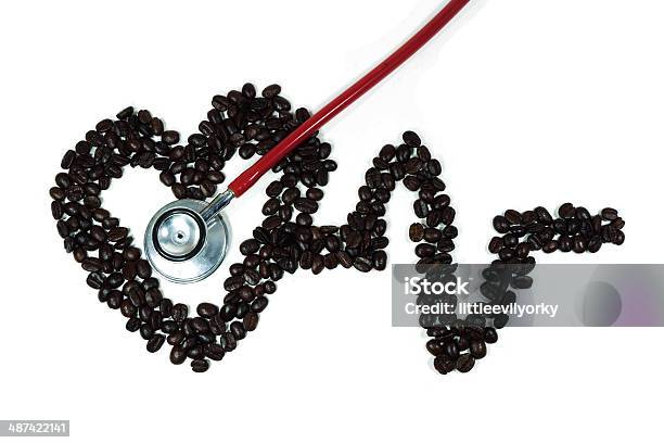 Stethoscope On Cardiogram Line Forming Heart Made From Coffee Bean Stock Photo - Download Image Now