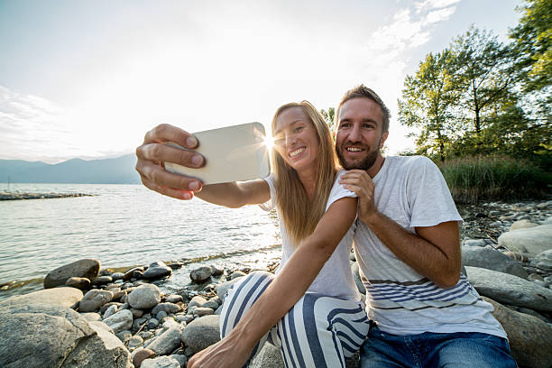 istock Couple capturing summer moments-Selfie portrait 487423570