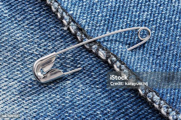 Safety Pin And Jeans Stock Photo - Download Image Now - Diaper Pin, Safety Pin, Denim
