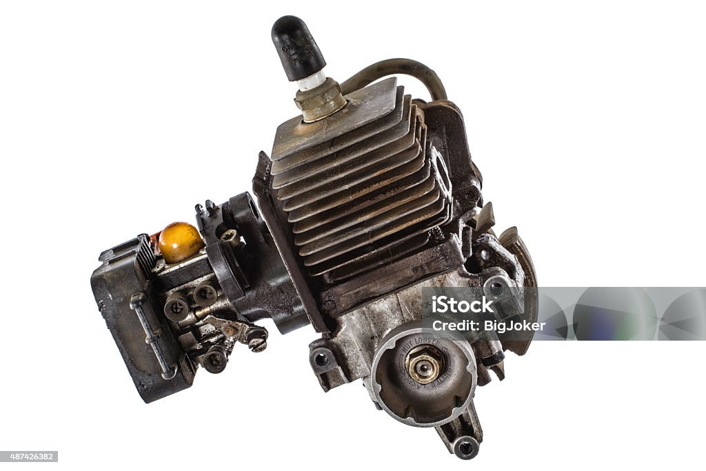 Old gasoline engine, isolated on white background Engine Stock Photo