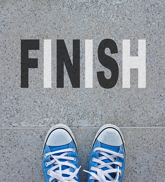 istock Pair of shoes on a road 487427066