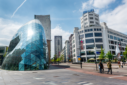 Eindhoven, Netherlands- May 24, 2015: Day view of the old Philips factory building and modern futuristic architecture in the city centre of Eindhoven. Western Europe