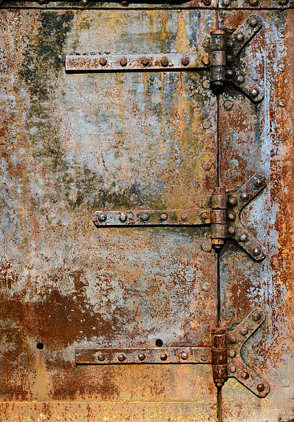 istock Rusty metal door details 487431008