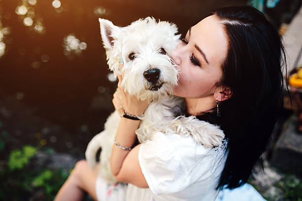istock girl with her dog 487432462