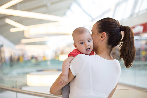 istock mother and baby playing 487436866