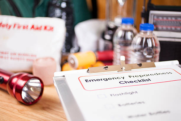 istock Emergency preparedness checklist and natural disaster supplies. 487436956