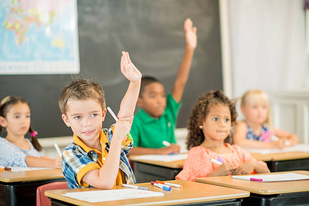 istock Children Answering Questions at School 487437102