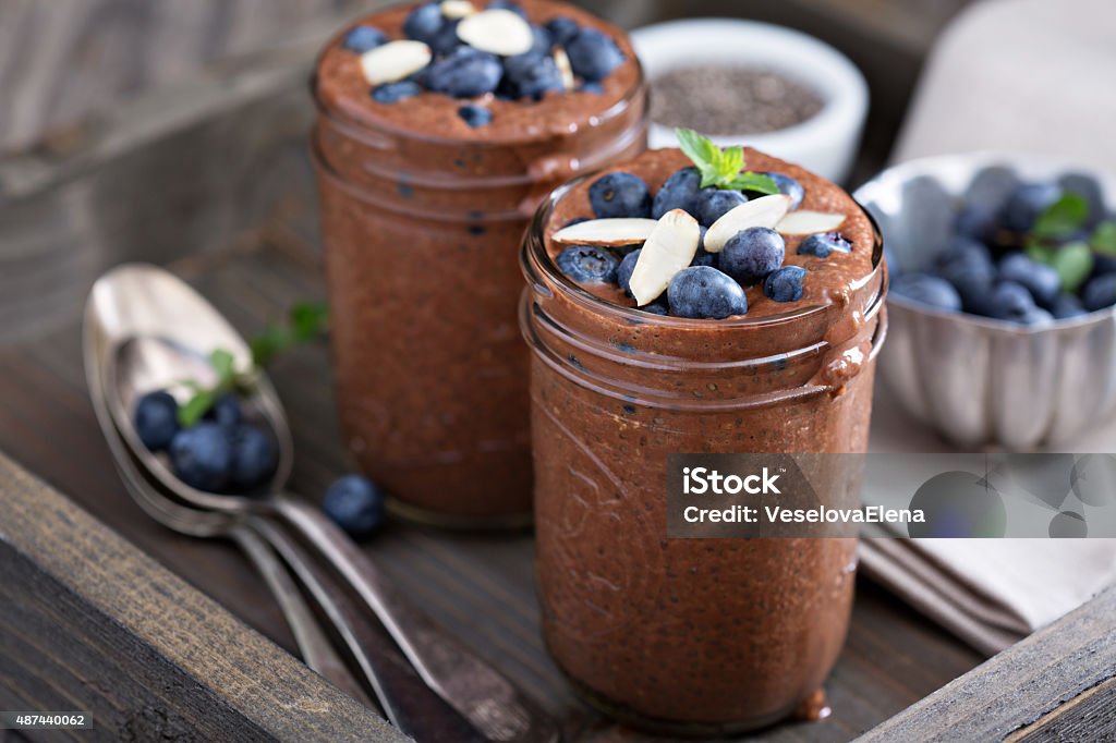 Healthy vegan chocolate chia pudding Healthy vegan chocolate chia pudding in jars 2015 Stock Photo