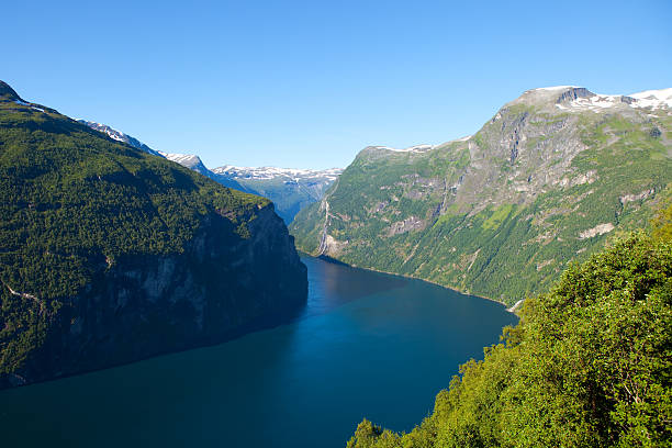 istock landscape with river between rocks, glaciers in background, 487440760