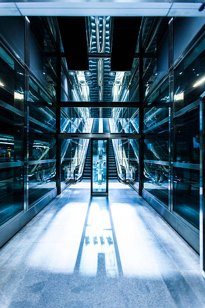 istock Escalator, modern stairs,futuristic background 487442060