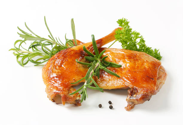 Roast duck legs Rosemary scented roast duck legs confit stock pictures, royalty-free photos & images