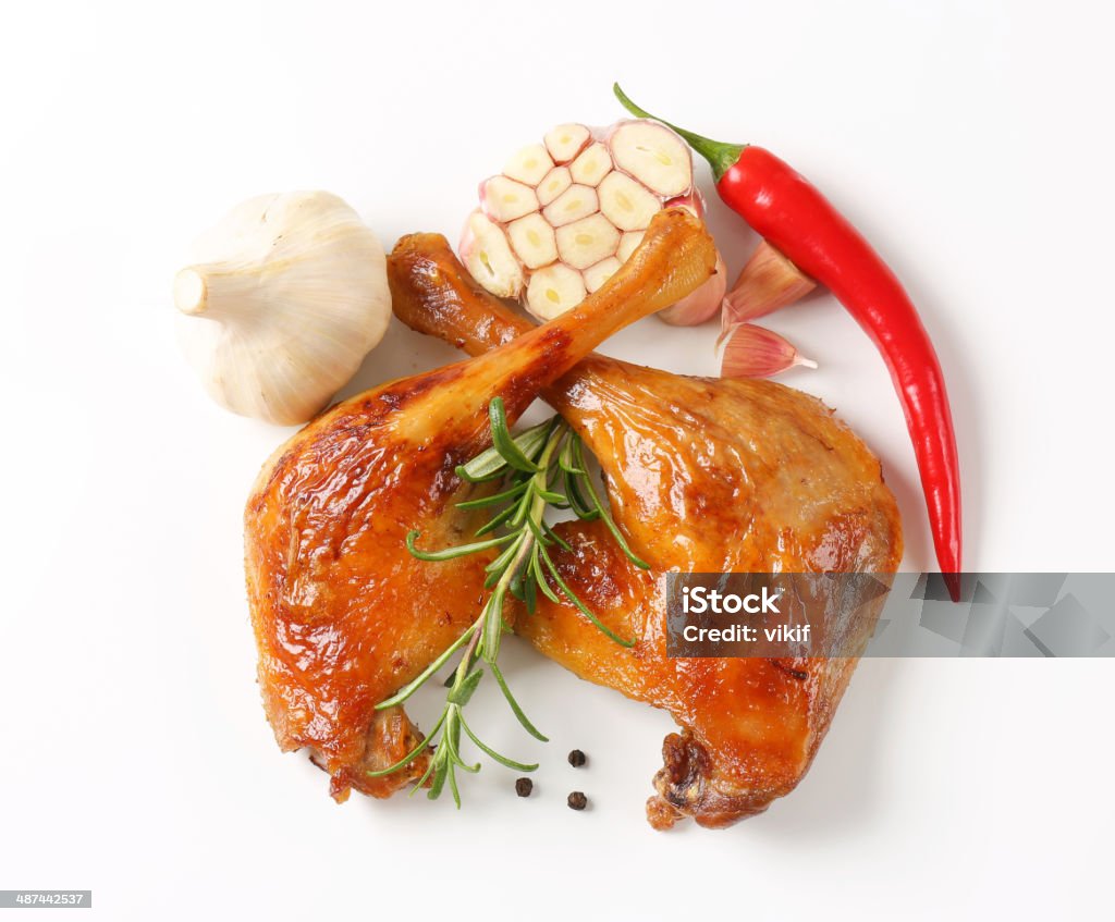 Roast duck legs Roast duck legs and other ingredients Baked Stock Photo