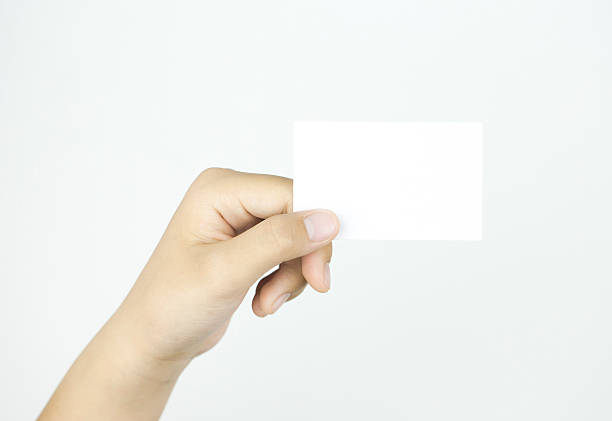 istock Blank business card in a hand 487442679