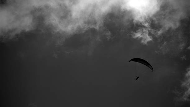 istock Paraglider in the Swiss air 487442775