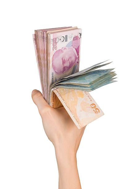 Hand Holding Turkish Lira Bankroll stock photo