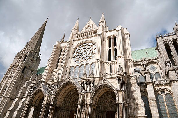 Notre Dame cathedral in Chartres Side view of famous Chartres Notre Dame cathedral chartres cathedral stock pictures, royalty-free photos & images