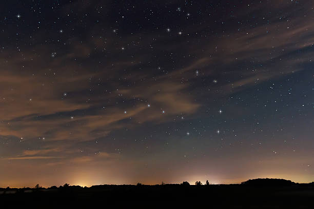 istock Beautiful night sky, with clouds and constellations 487444750