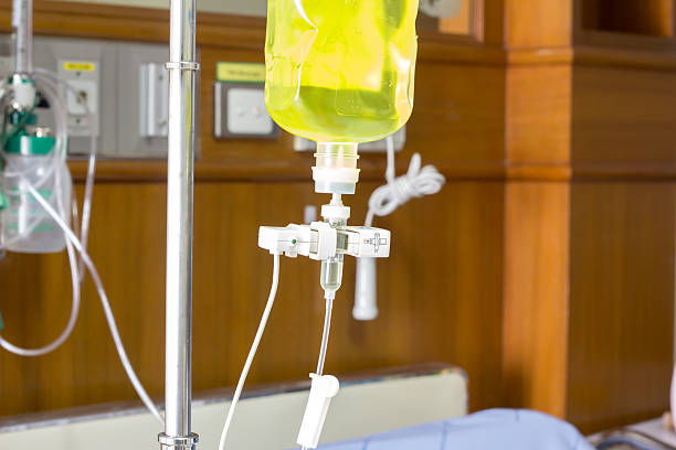 Infusion bottle with saline solution stock photo