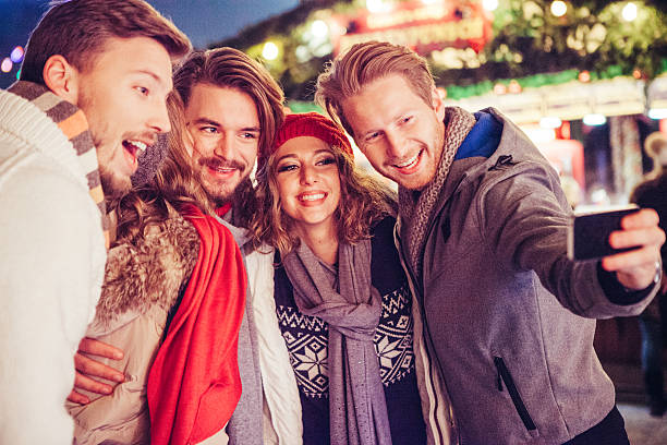 istock Friends having fun outdoors at winter holidays. 487445538
