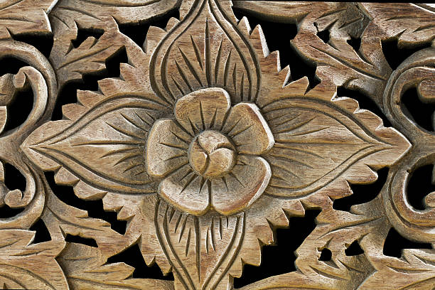 istock Antique vintage wood sculpture on black background 487450154