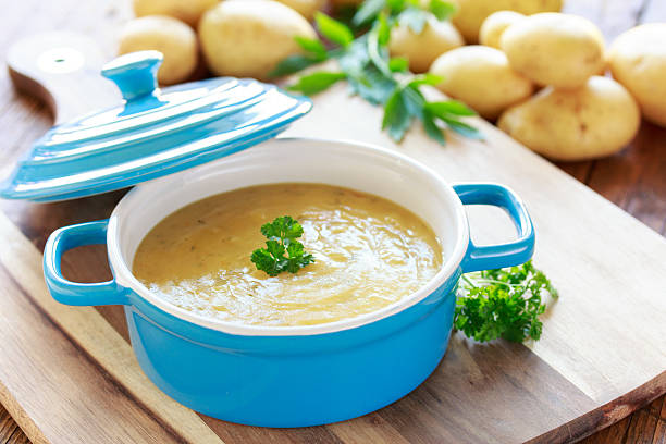 homemade potato soup with parsley stock photo