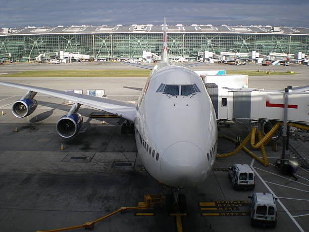 London Heathrow Terminal 5 Passengers frequently travel with British Airways through London Heathrow Airport's new terminal five. heathrow airport stock pictures, royalty-free photos & images