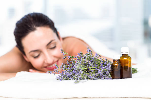 istock Smiling woman getting an aromatherapy treatment 487452748