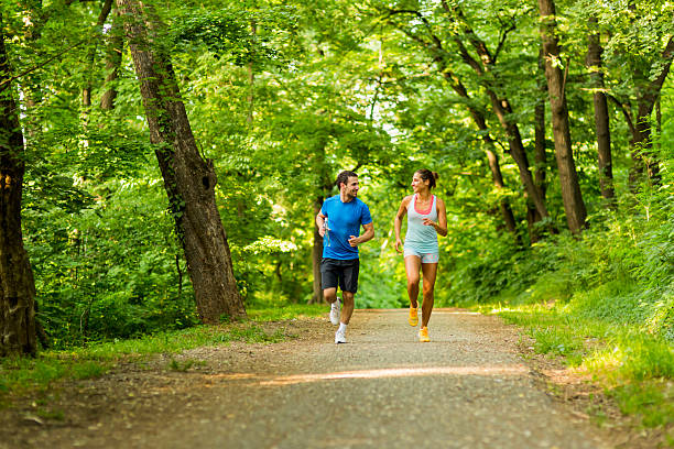 istock Young people running in nature 487452910