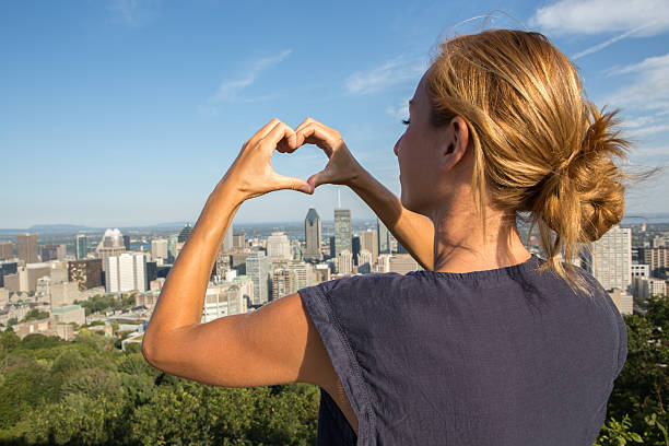 istock Young woman loving Montreal 487455386