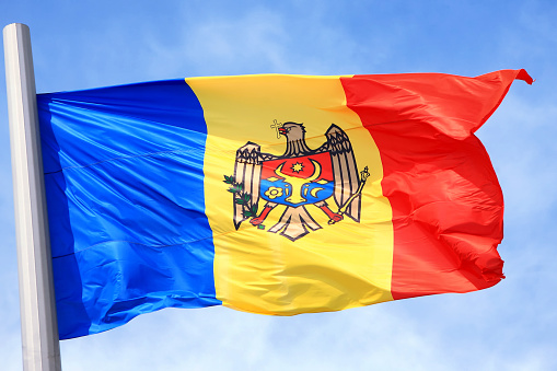 The Moldavian flag against the blue sky
