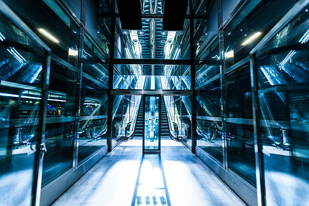 istock Escalator, modern stairs,futuristic background 487456634