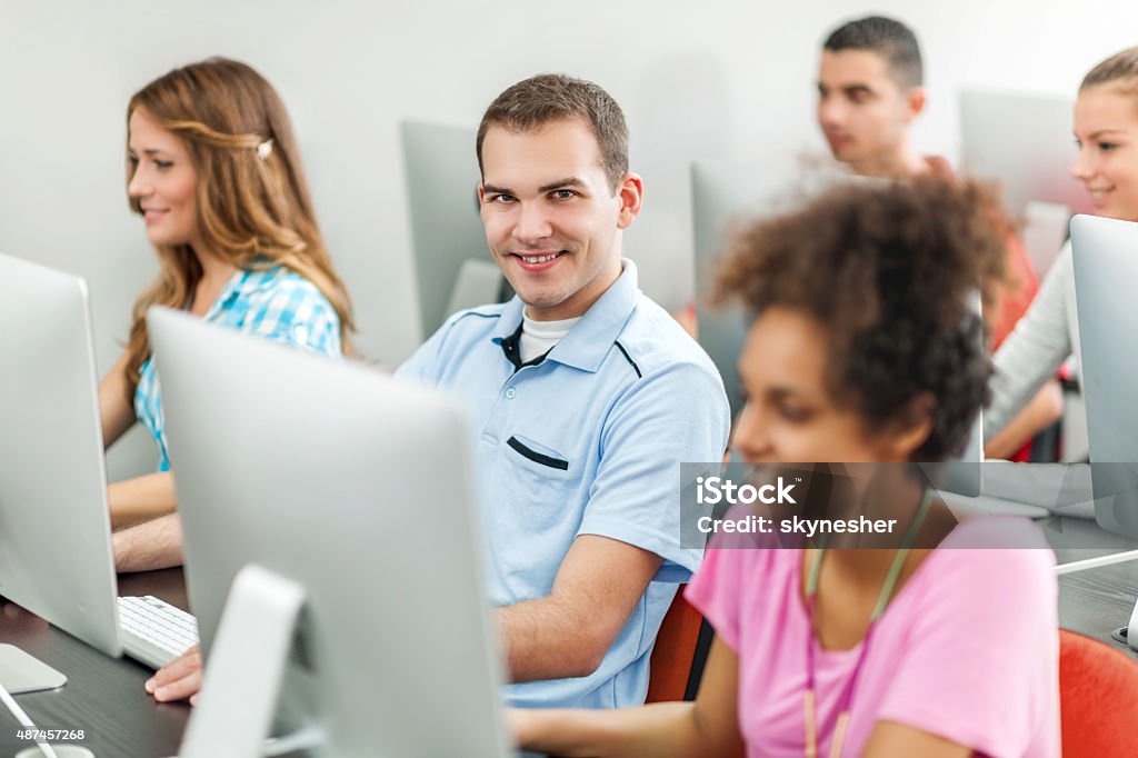 Person Computer Learning Smiling Young People Learning At A Computer Class Stock Photo ...
