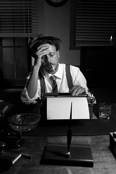 istock Reporter working late at night and smoking in his office 487458368