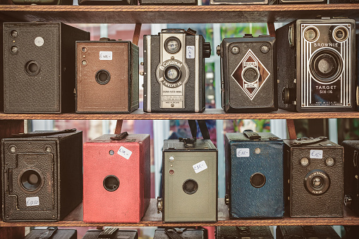Doesburg, The Netherlands - August 23, 2015: Sepia toned image of old box cameras on a flee market in Doesburg, The Netherlands