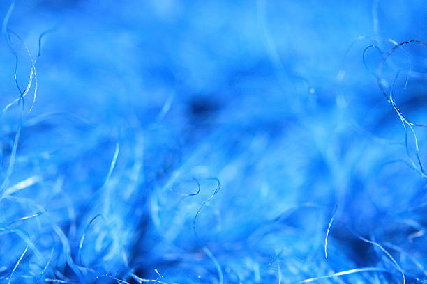ブルーのウールファイバ質感のクローズアップ - wool close up knitting fiber ストックフォトと画像