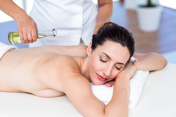 istock Smiling woman getting an aromatherapy treatment 487463026