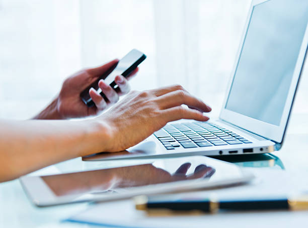 istock Laptop and telephone 487463635