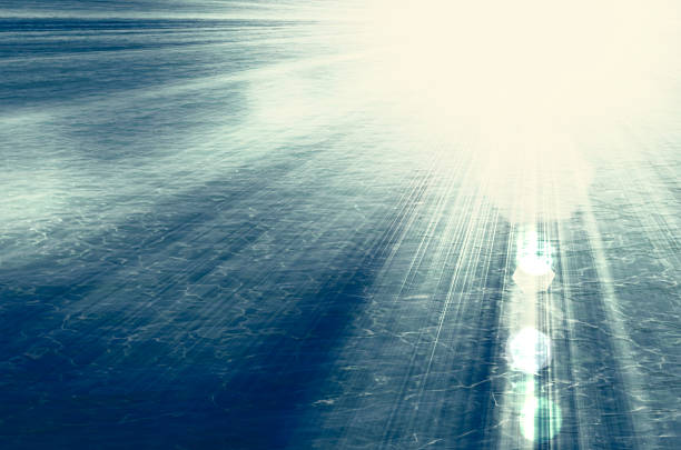 Sunburst rays over moody sea