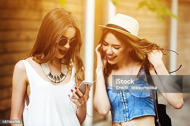 Two Young Beautiful Girls Stock Photo - Download Image Now - Fashion, Lifestyles, 2015