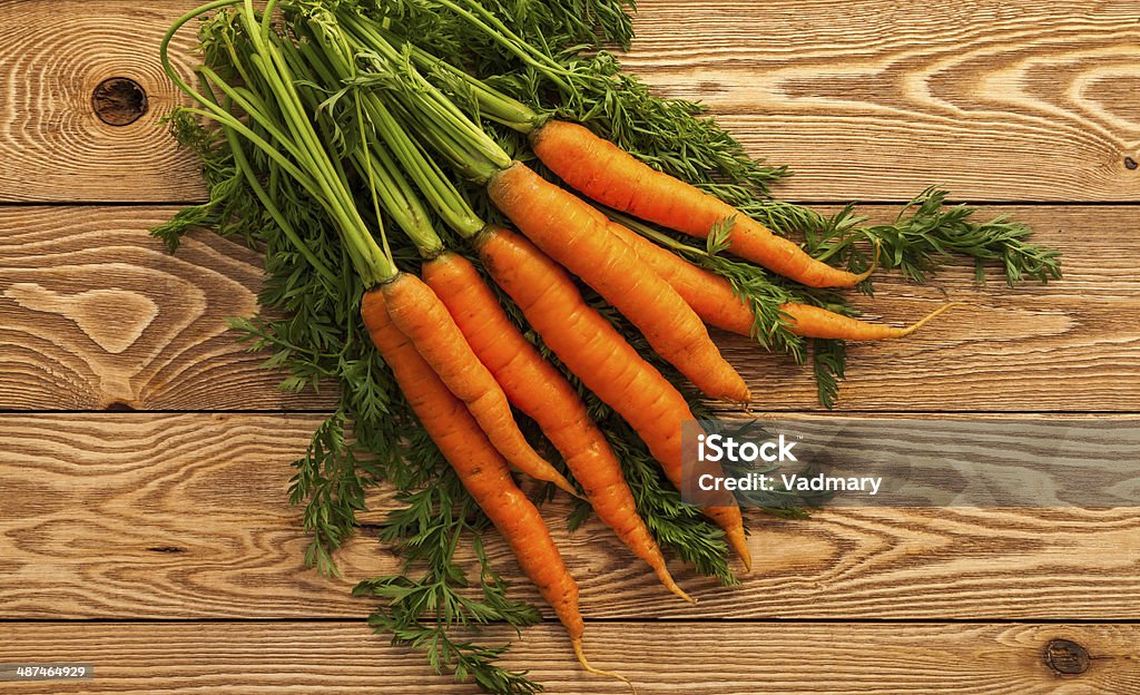 Vegetables Carrots on a wooden background Agriculture Stock Photo