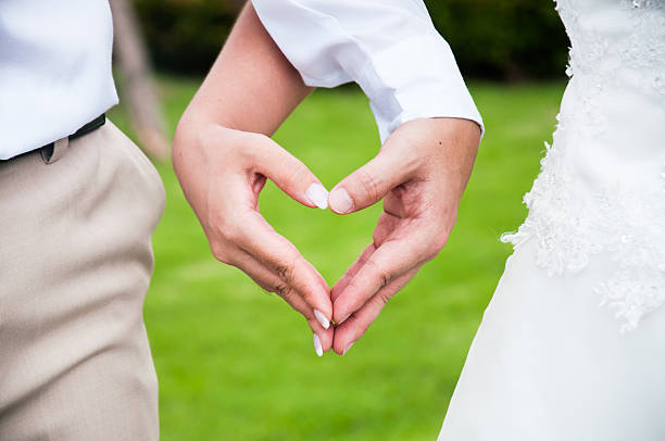 istock Hand's couple drawing hearts symbol 487467915