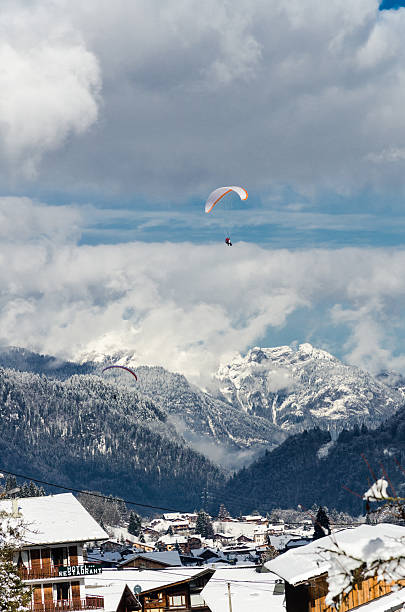 istock Paragliders flying over the mountain 487468637