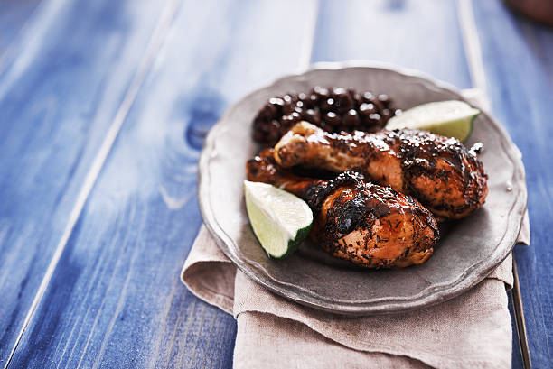 istock caribbean jerk chicken and black beans 487470526