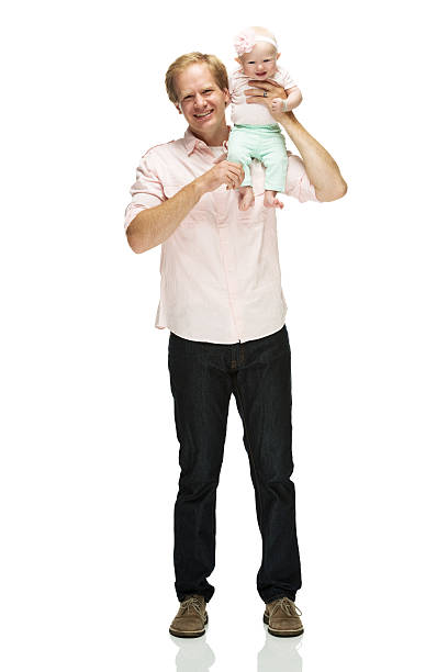istock Smiling father holding his baby 487471397
